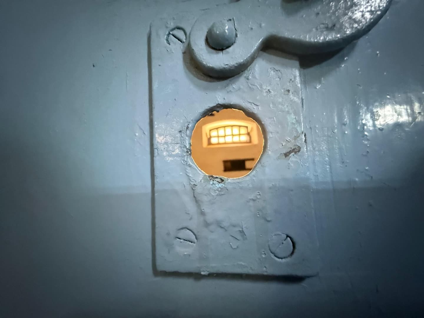 Original cell-door peephole at Kordin
